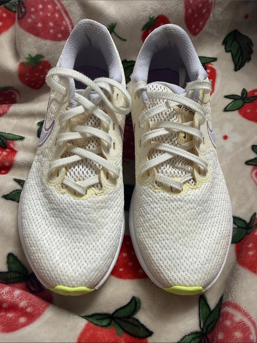 Nike Women’s White Running Shoes with Light Purple Swoosh and Yellow Accent